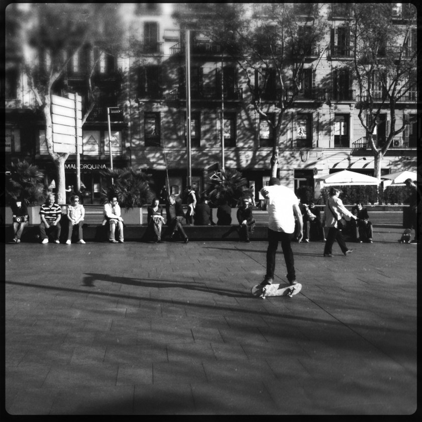 Net gescoord bij Starbucks, nu zittend op Playa Universitat